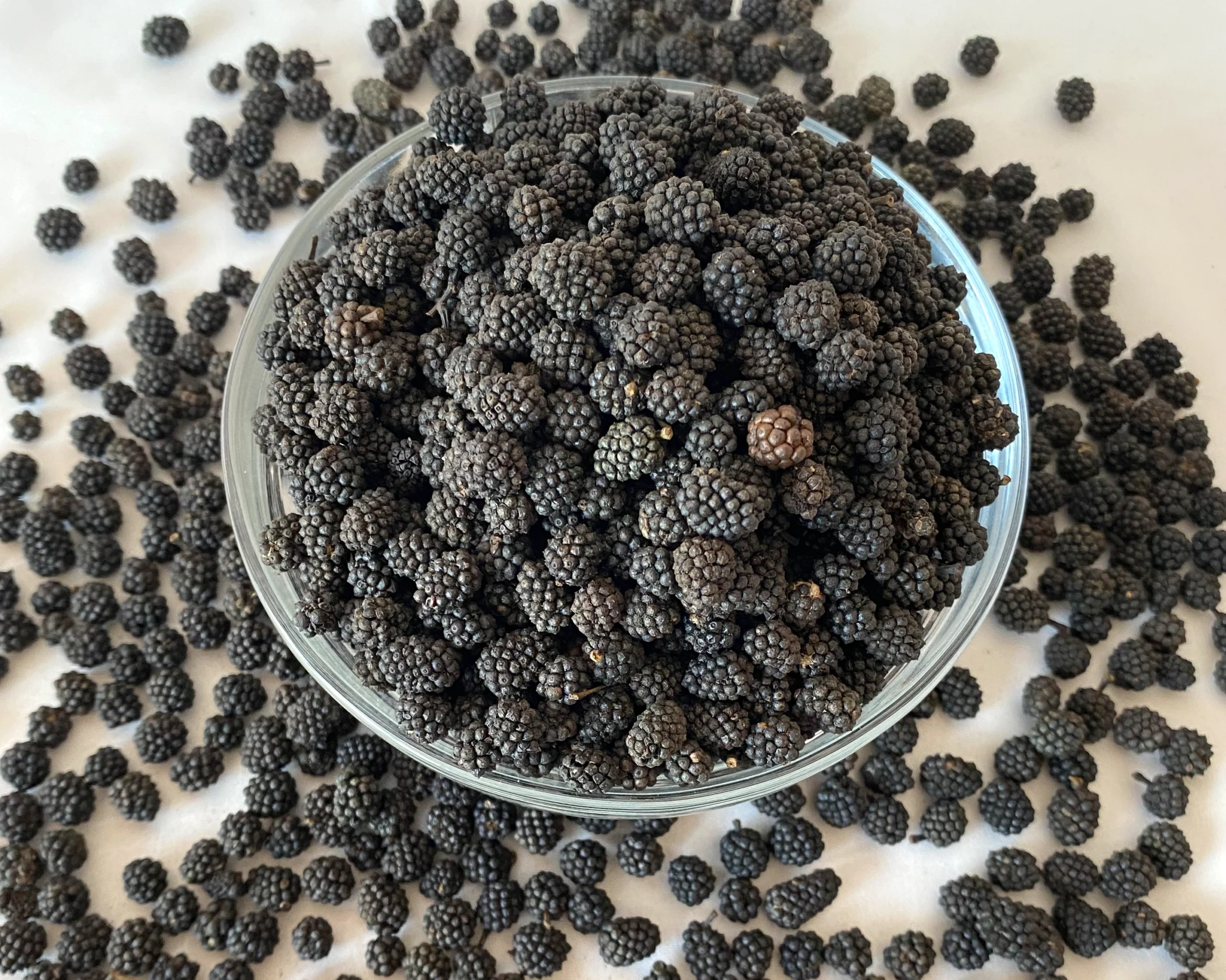 Assam Pepper (Piper mullesua) with earthy aroma.